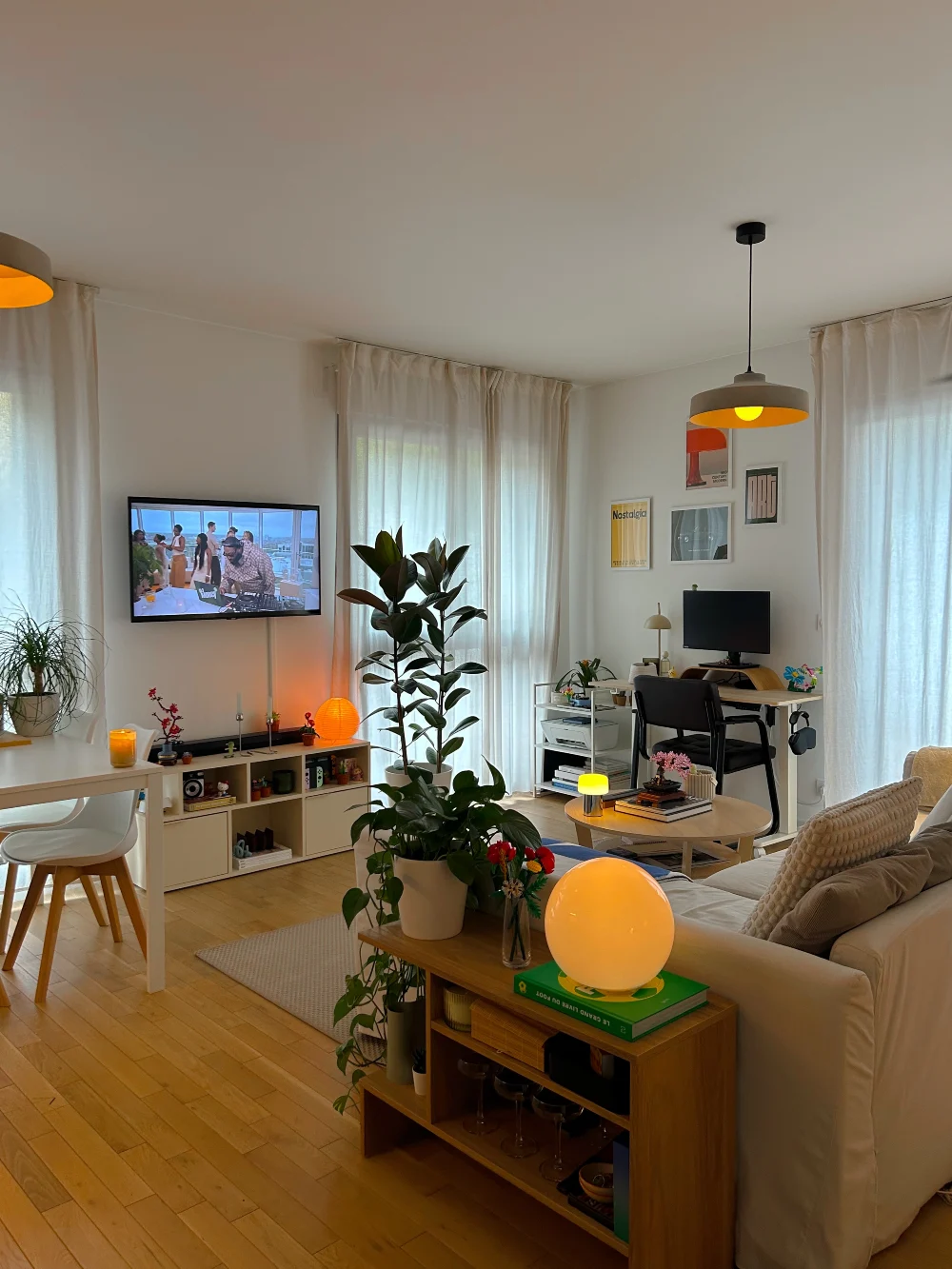 Multi-Zone Living Room with Floating Media Console and Warm Desk Corner Glow