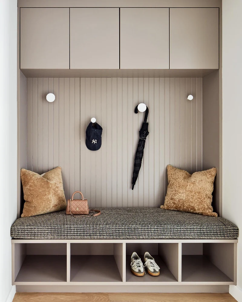 Mushroom-Toned Alcove Unit with Houndstooth Cushion and Round White Pegs