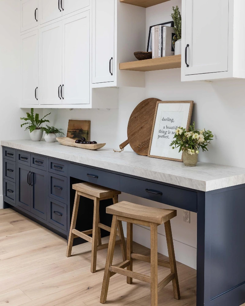 Navy Counter Nook with Wood Stools, Open Shelves, and Leaning Cutting Boards