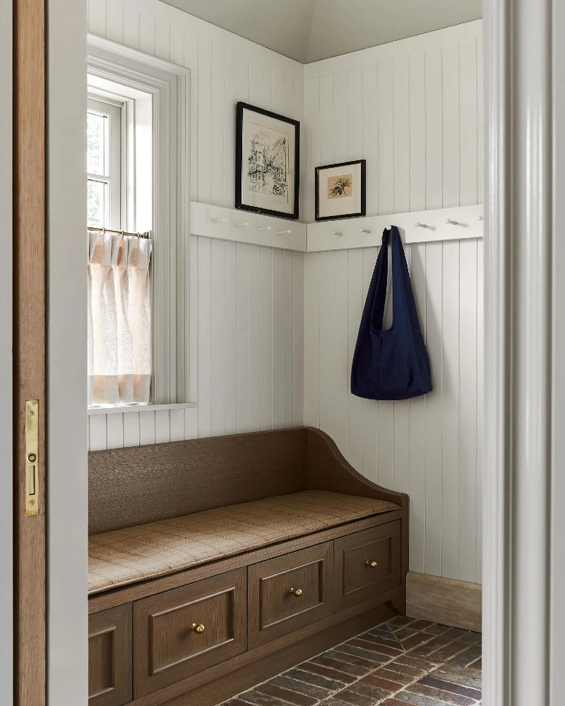 Oak Storage Bench with Plaid Cushion and Wraparound Peg Rail
