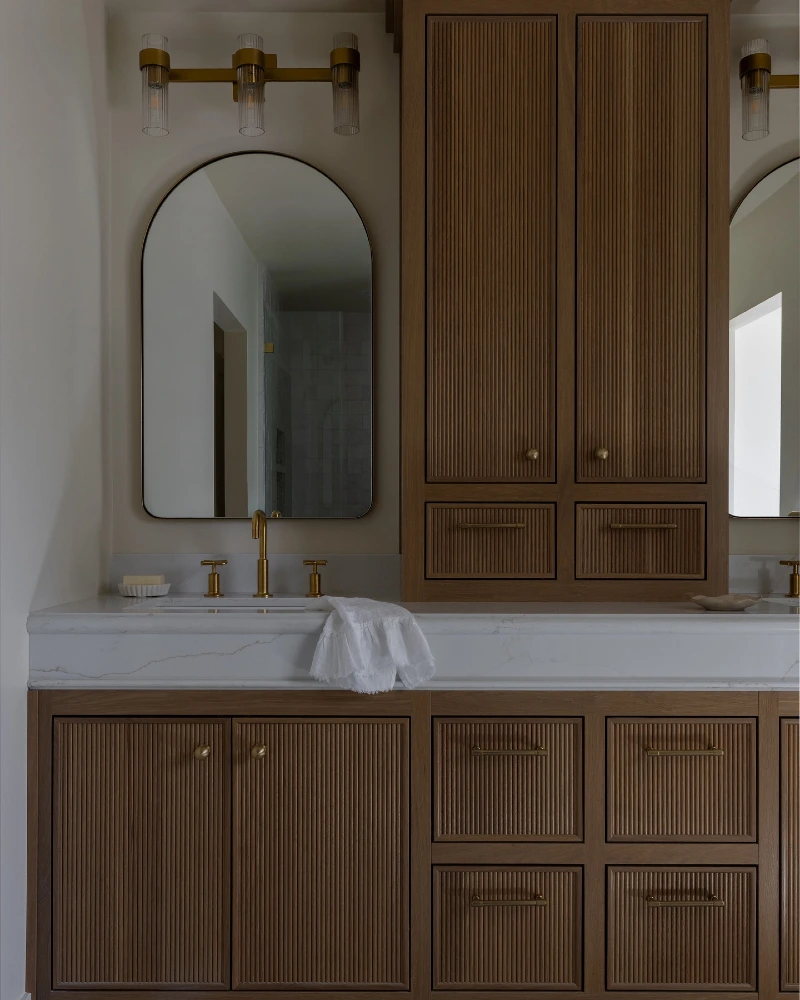 Reeded Wood Vanity with Counter-Sitting Tower and Fluted Glass Brass Sconce