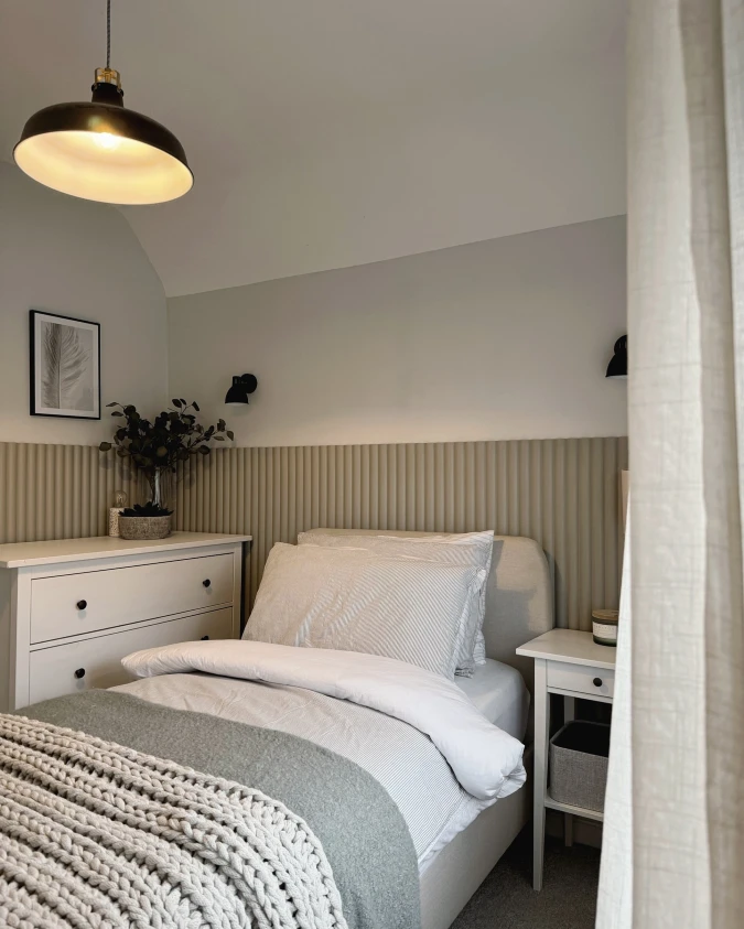 Ribbed Half Wall with Black Pendant and Chunky Knit Bedding