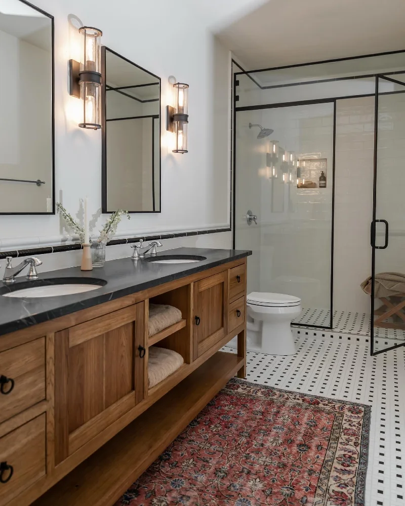 Rich Oak Vanity with Charcoal Soapstone Countertop and Vintage Patterned Runner