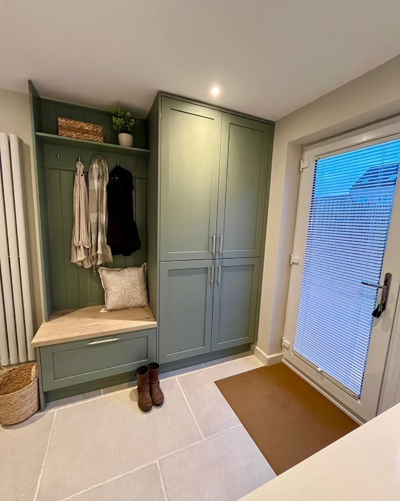 Sage Green Mudroom Wardrobe with Natural Wood Bench and Shiplap Backing