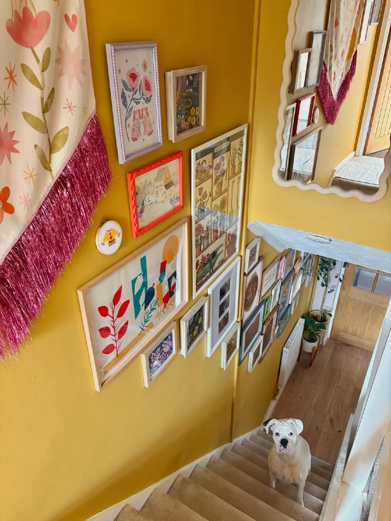 Saturated Mustard Yellow Walls with a Maximalist Gallery Collection and Fringed Banner