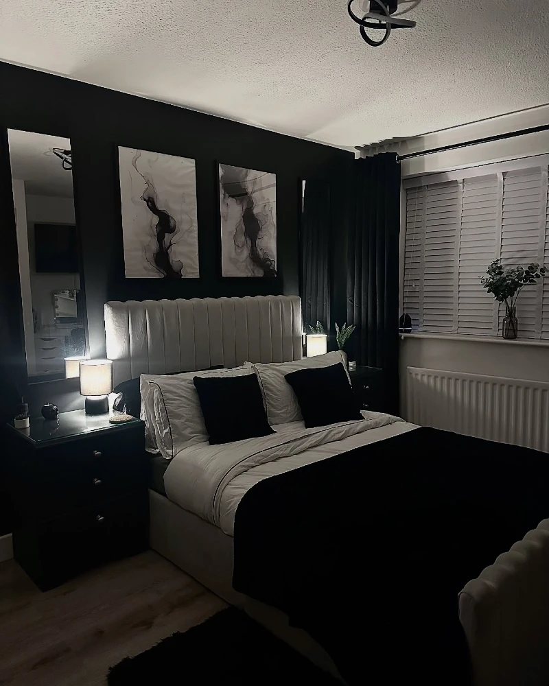Soft Monochrome Bedroom with Sculpted Headboard and Abstract Triptych Art