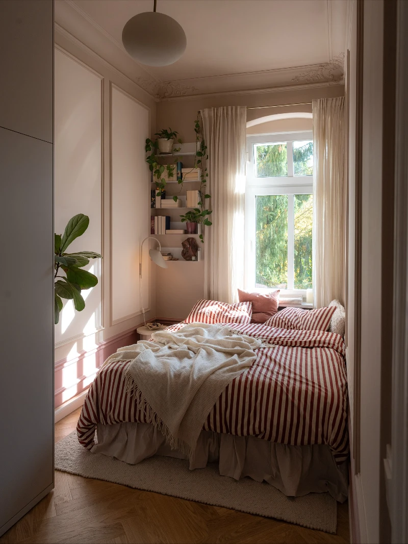 Striped Linen Bed with Window-Side Plant Shelf in Compact Bedroom