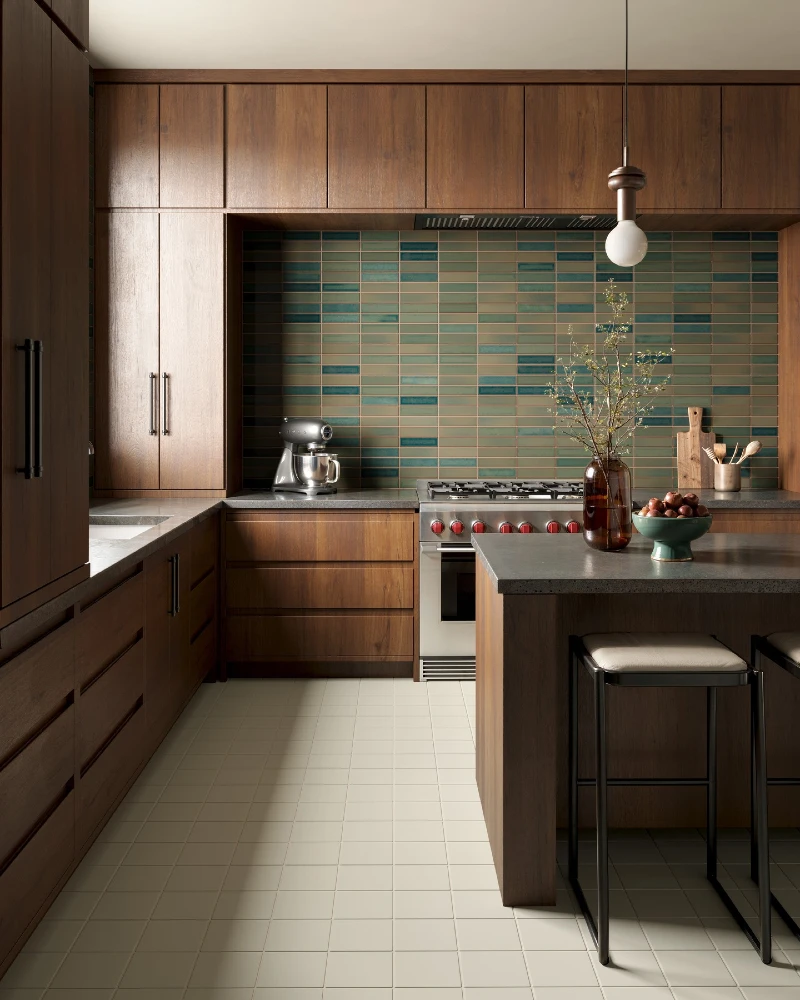Walnut Wood Kitchen Wall with Teal Mosaic Backsplash and Island Seating