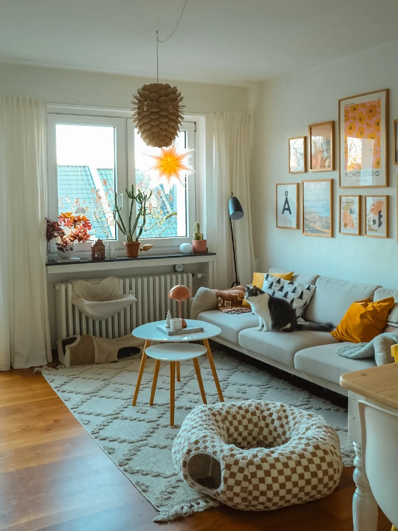 Warm Eclectic Gallery Wall with Wood Frames and Soft Neutral Layers