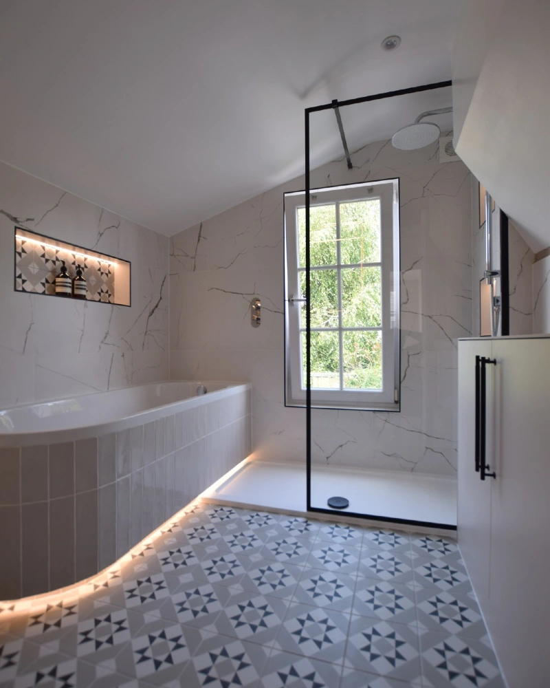 White Marble Tile Walk-In Shower with Floating Apron Tub and Starburst Floor
