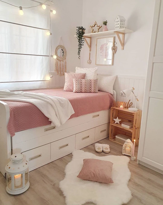 White Storage Daybed with Pink Quilt and Crate Nightstand