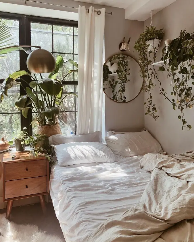 Window Bed with Hanging Pothos and White Linen Layers