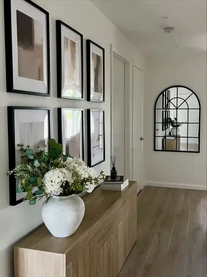 Wooden Credenza with a Grid Gallery Wall