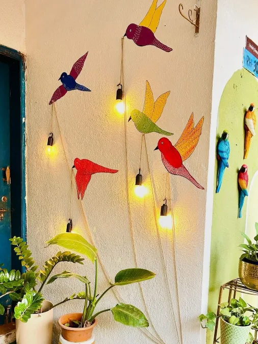 Painted Bird and Hanging Light Installation