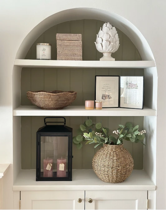 Arched Alcove Shelving Brings Cottage Charm to a Bare Corner