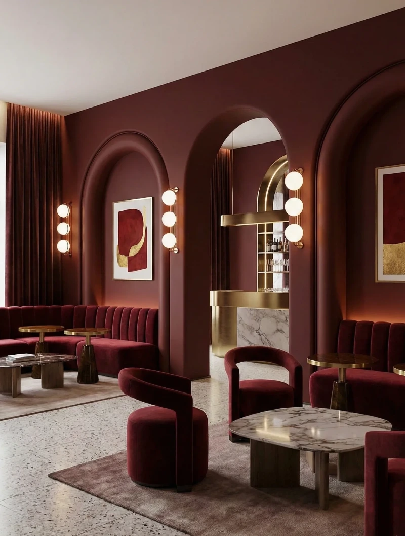 Arched Alcoves and Velvet Seating in a Moody Burgundy Lounge
