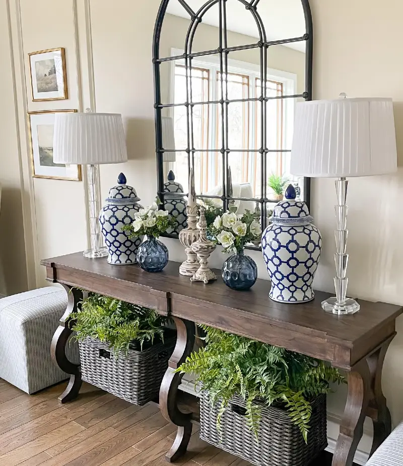 Arched Iron Mirror with Blue-and-White Ginger Jars and Crystal Lamps