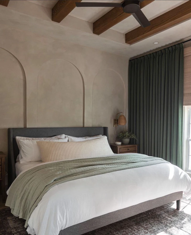 Arched Plaster Wall Niches with Deep Green Drapes