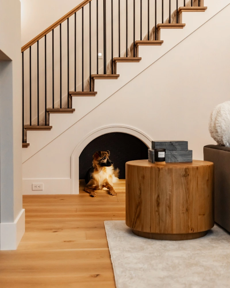 Arched Under-Stair Alcove with Natural Wood Flooring