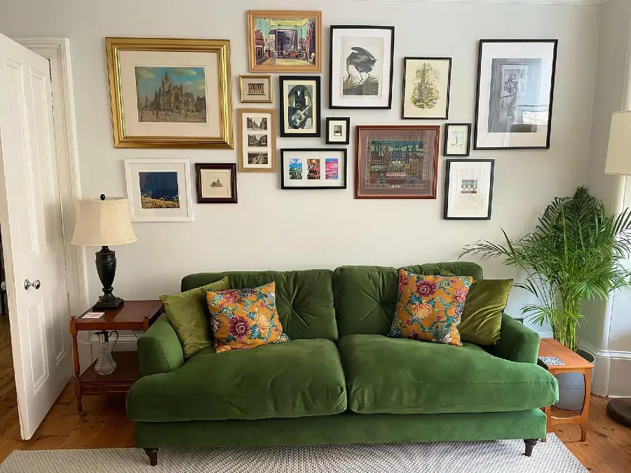 Asymmetrical Mixed Frame Gallery Wall Over Velvet