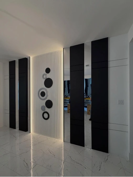 Backlit Geometric Slat Wall With Mirrors