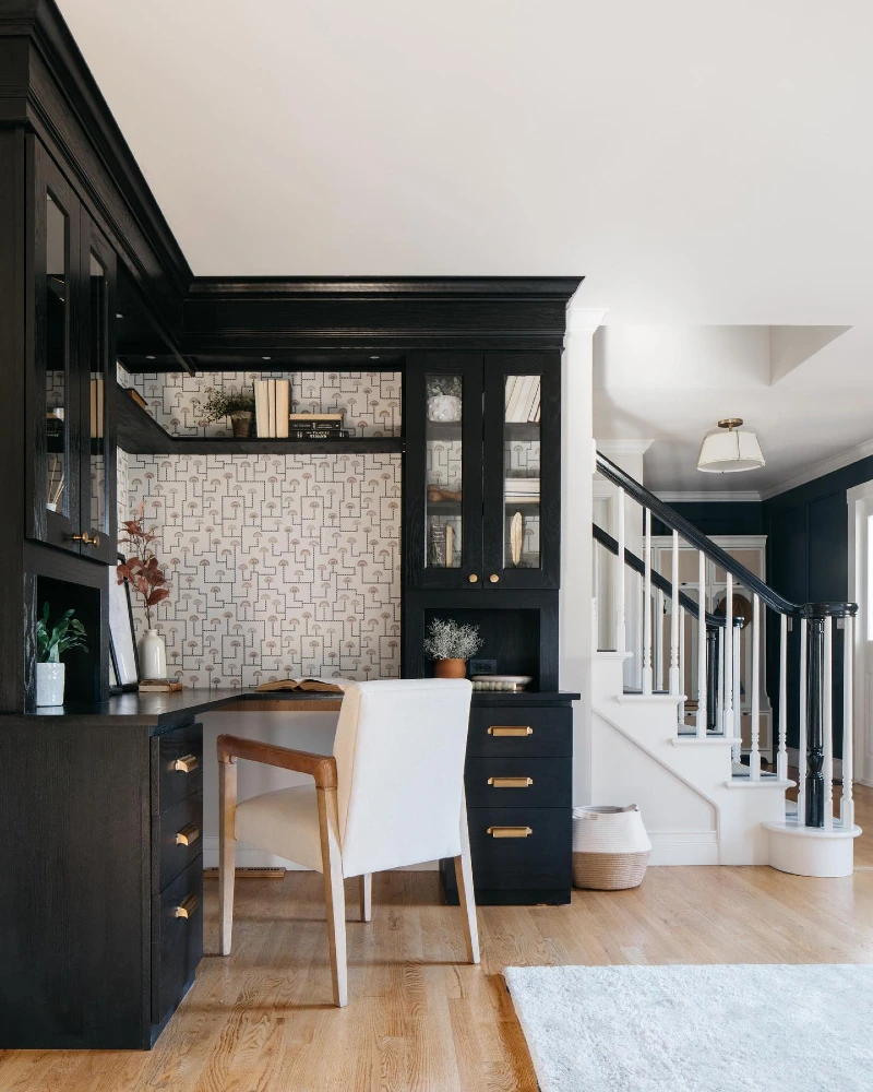 Black Built In Corner Desk with Glass Cabinets and Brass Hardware