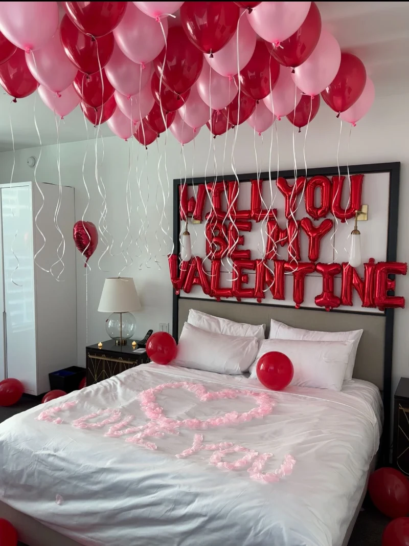 Black Framed Headboard with Red Letter Balloons and Soft Pink Petal Script