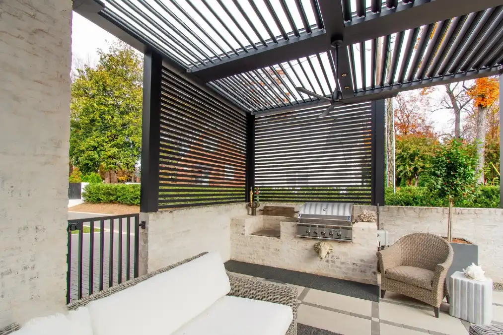 Black Louvered Screens Over Whitewashed Brick