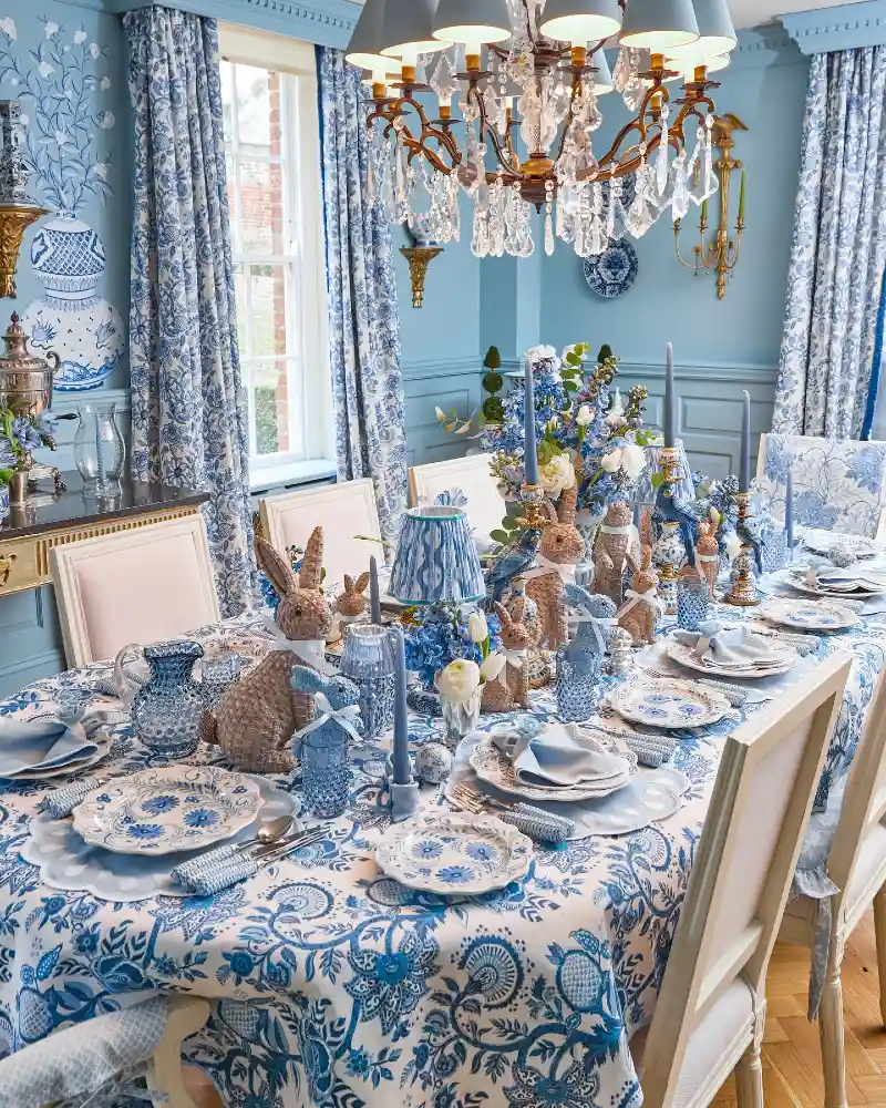Blue-and-White Toile Table with Woven Bunnies and Crystal Chandelier
