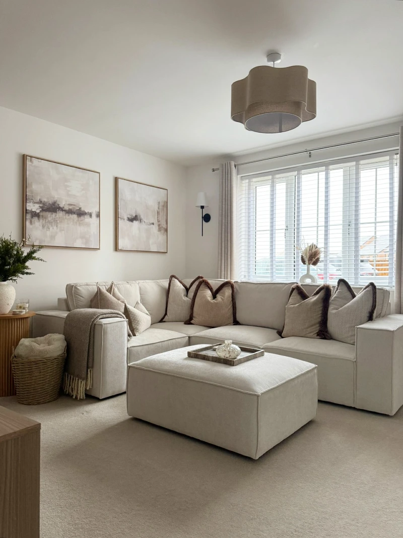  Boxy Cream Sectional with Tailored Piped Cushions and a Square Ottoman