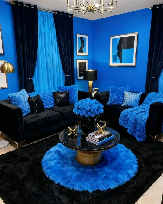 Bright Blue Walls And Black Velvet Seating