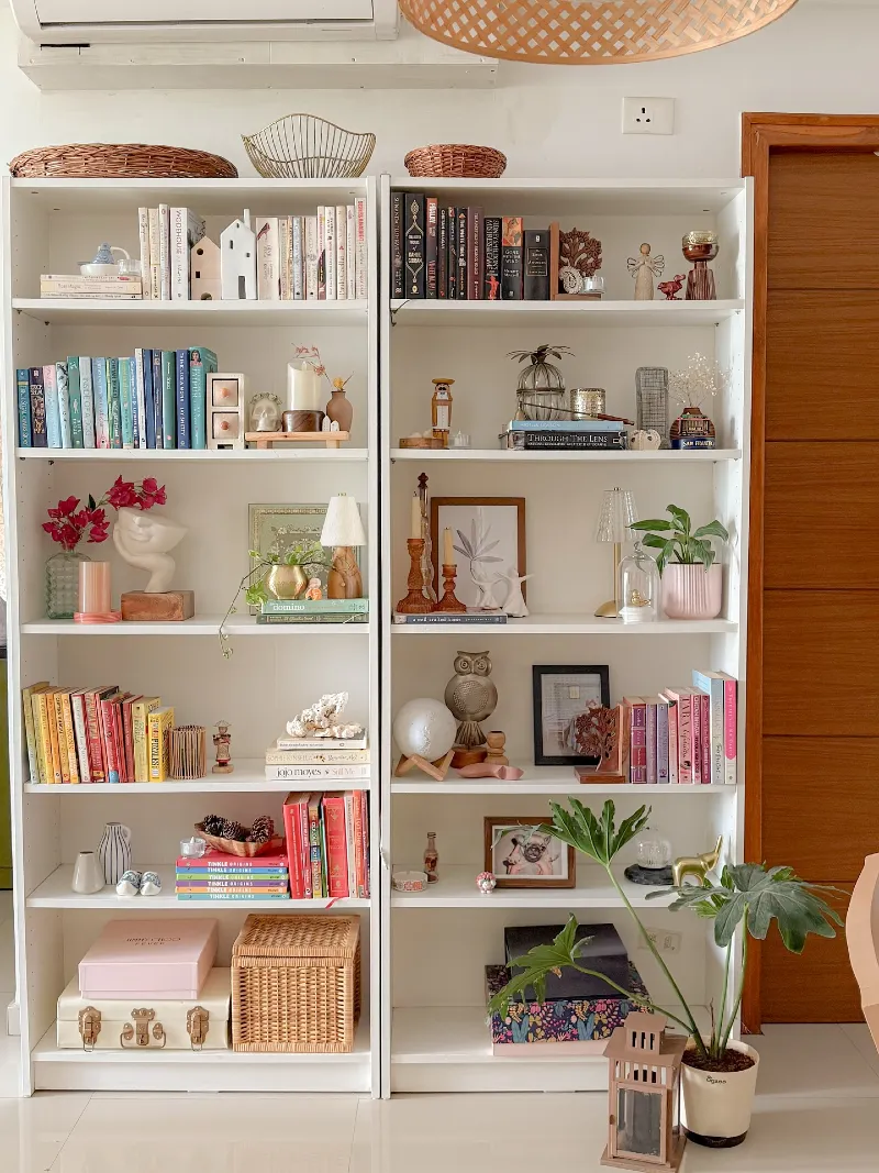 Bright White Twin Shelving with Playful Object Groupings