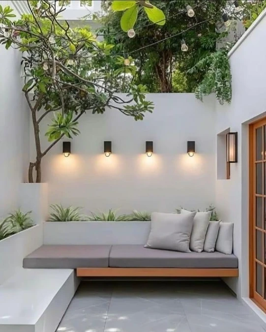 Built In Seating Maximizes Tiny Courtyards