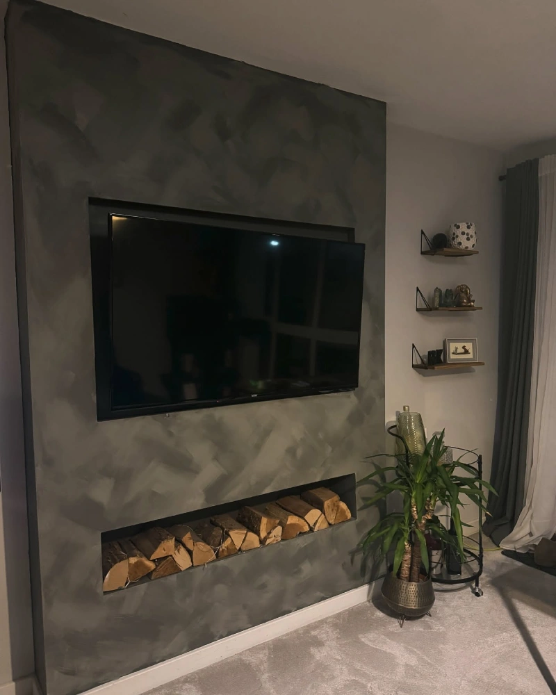 Charcoal Venetian Plaster Focal Wall with Built-In Log Storage