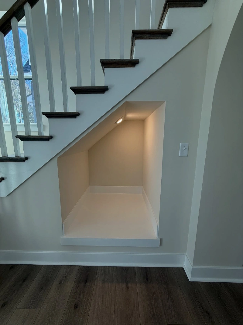 Clean-Lined Under-Stair Alcove with Recessed Lighting
