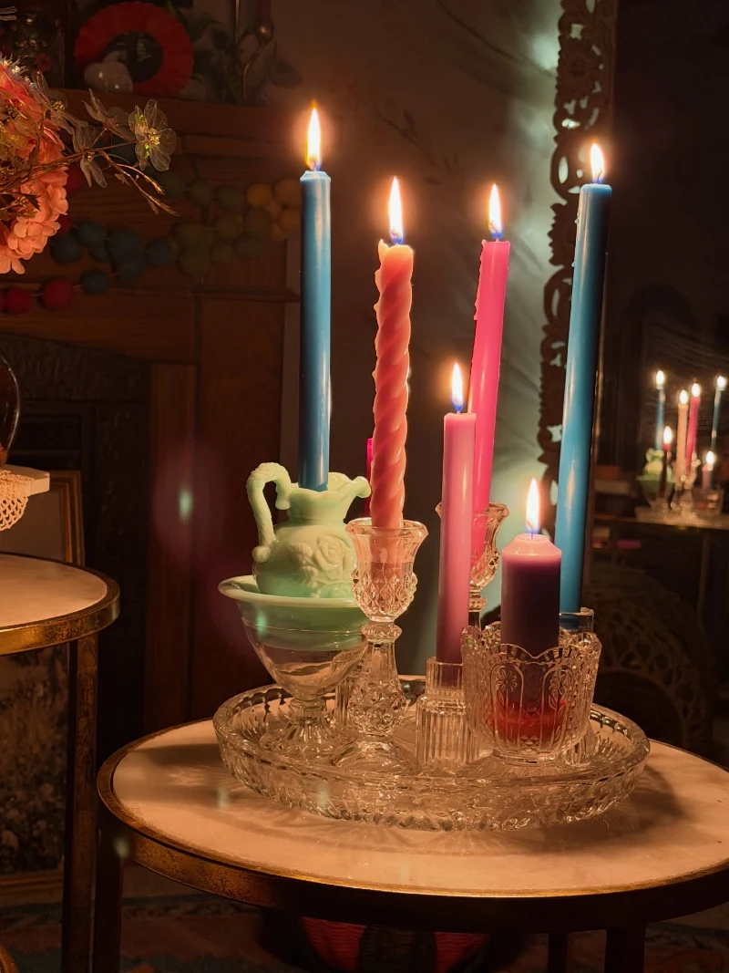 Clear Cut-Glass Tray with Bright Blue Tapers, Pink Spiral Candlesticks, and Mint Jadeite Pitcher