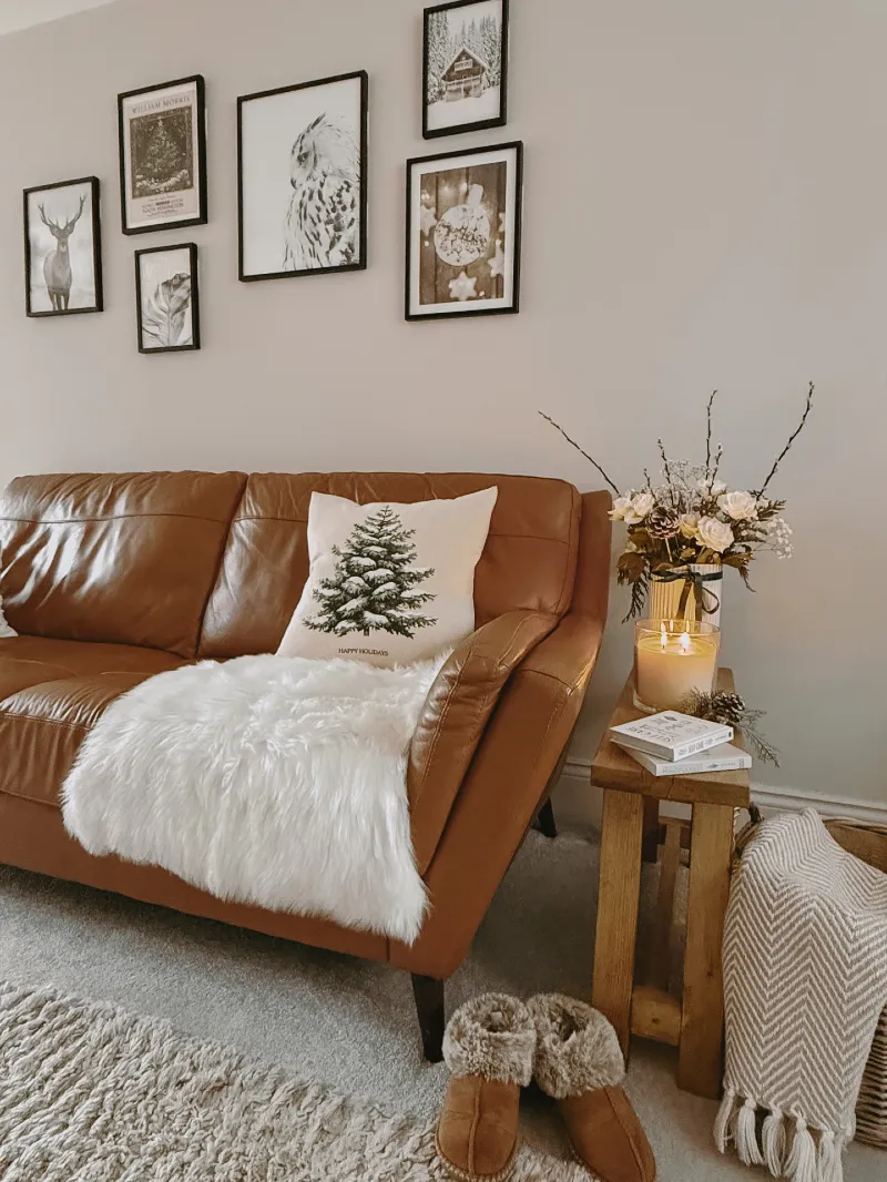Cognac Leather Sofa with Faux Fur Throw and Neutral Gallery Wall