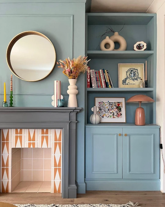 Color Drenched Alcove Shelving Steals the Spotlight From the Fireplace