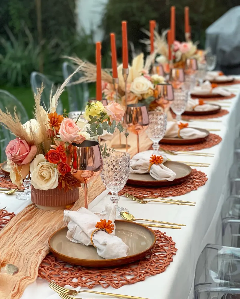 Coral-Toned Floral Centerpiece with Copper Accents