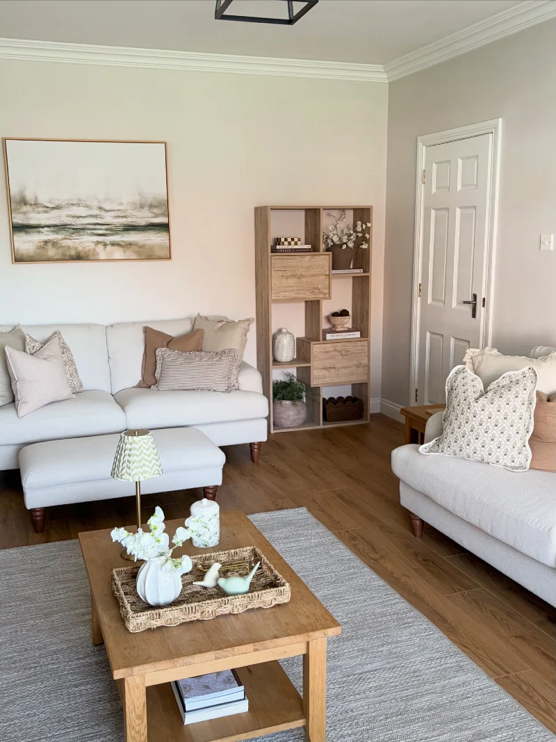 Cream Sofas with an Oak Coffee Table and Open Cubby Shelf