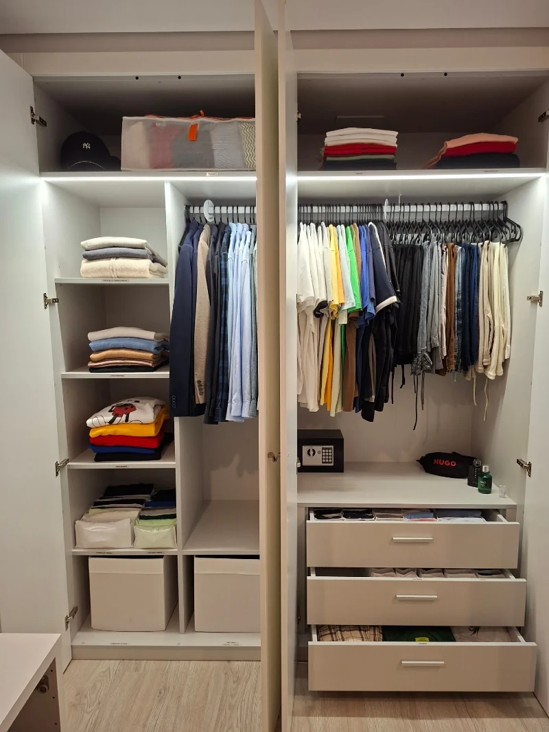 Crisp White Closet with Color-Coded Hanging and Drawer Dividers