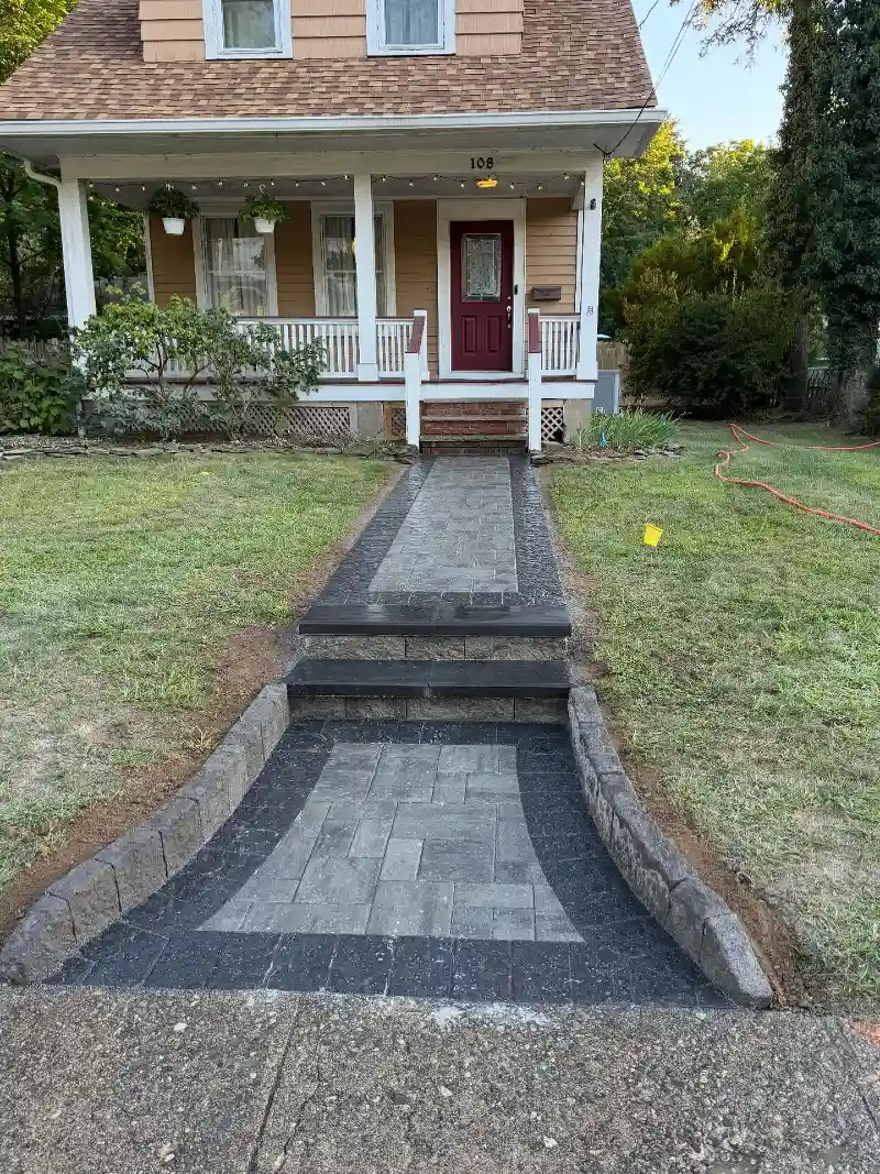 Dark Border Paver Walkway with Raised Entry Steps and Clean Lines