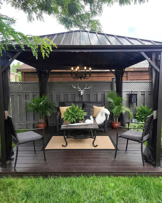 Dark Metal Gazebo And Moody Fences