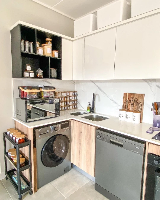 Dark Open Cubby Cabinet Above the Microwave Adds Vertical Pantry Storage