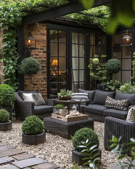 Dark Wicker Seating Anchors Crushed Stone Patios