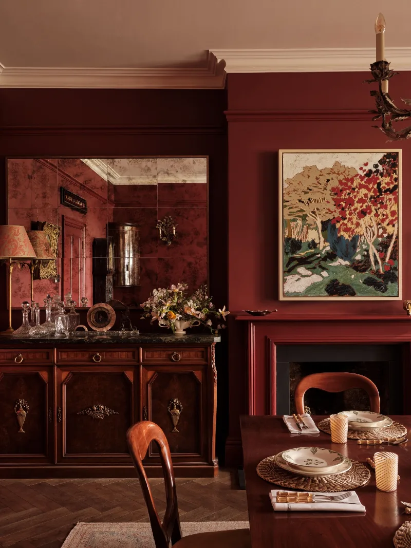 Deep Burgundy Dining Room with Antiqued Mirror and Traditional Woodwork