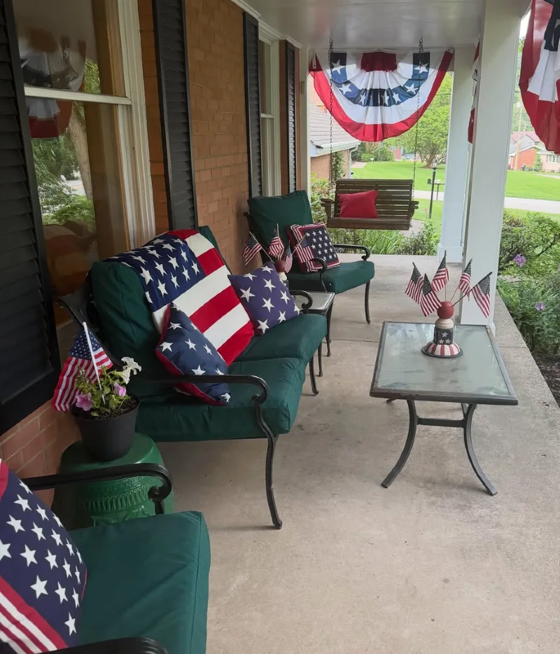 Deep Forest Green Patio Seating with Layered American Flag Linens