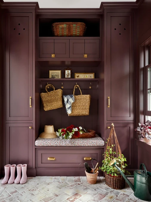 Deep Plum Mudroom With Brick Flooring