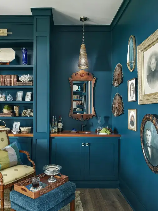 Deep Teal Home Bar With Vintage Accents