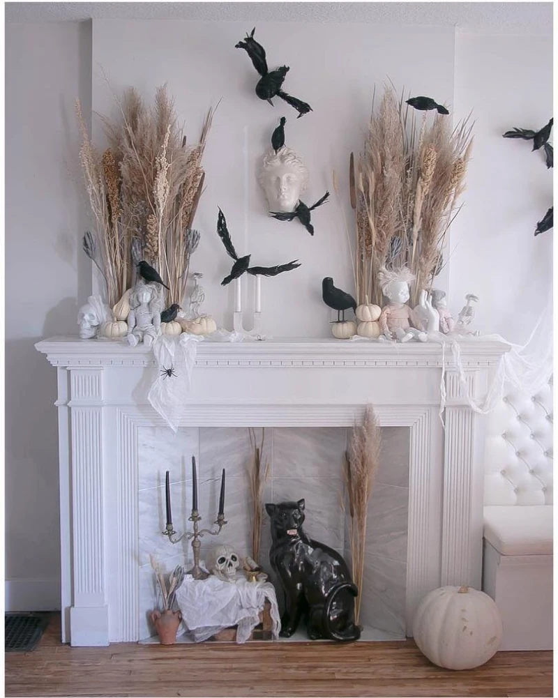 Dried Pampas Grass Mantel with Swarming Black Crows and a Ceramic Statue Head